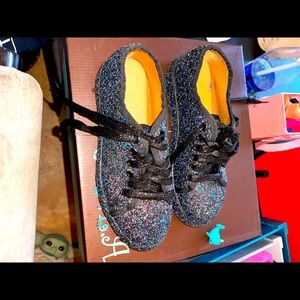 Size 7 super glittery running shoes.